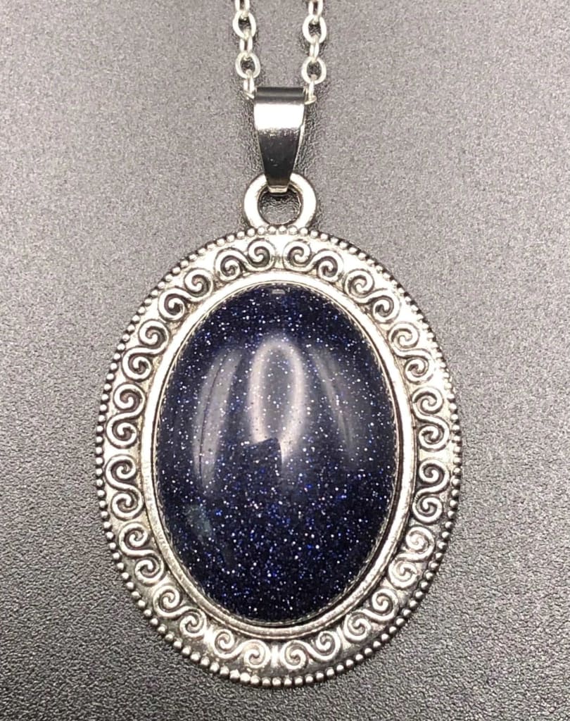 Antique blue goldstone x silver pendant